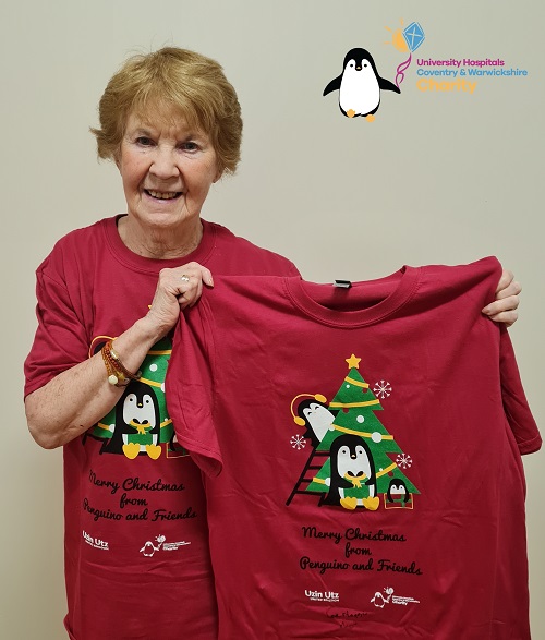 Maggie Celebrates 1 Year Anniversary of Worlds 1st Covid-19 Vaccine with new Penguino and Friends T-shirt 