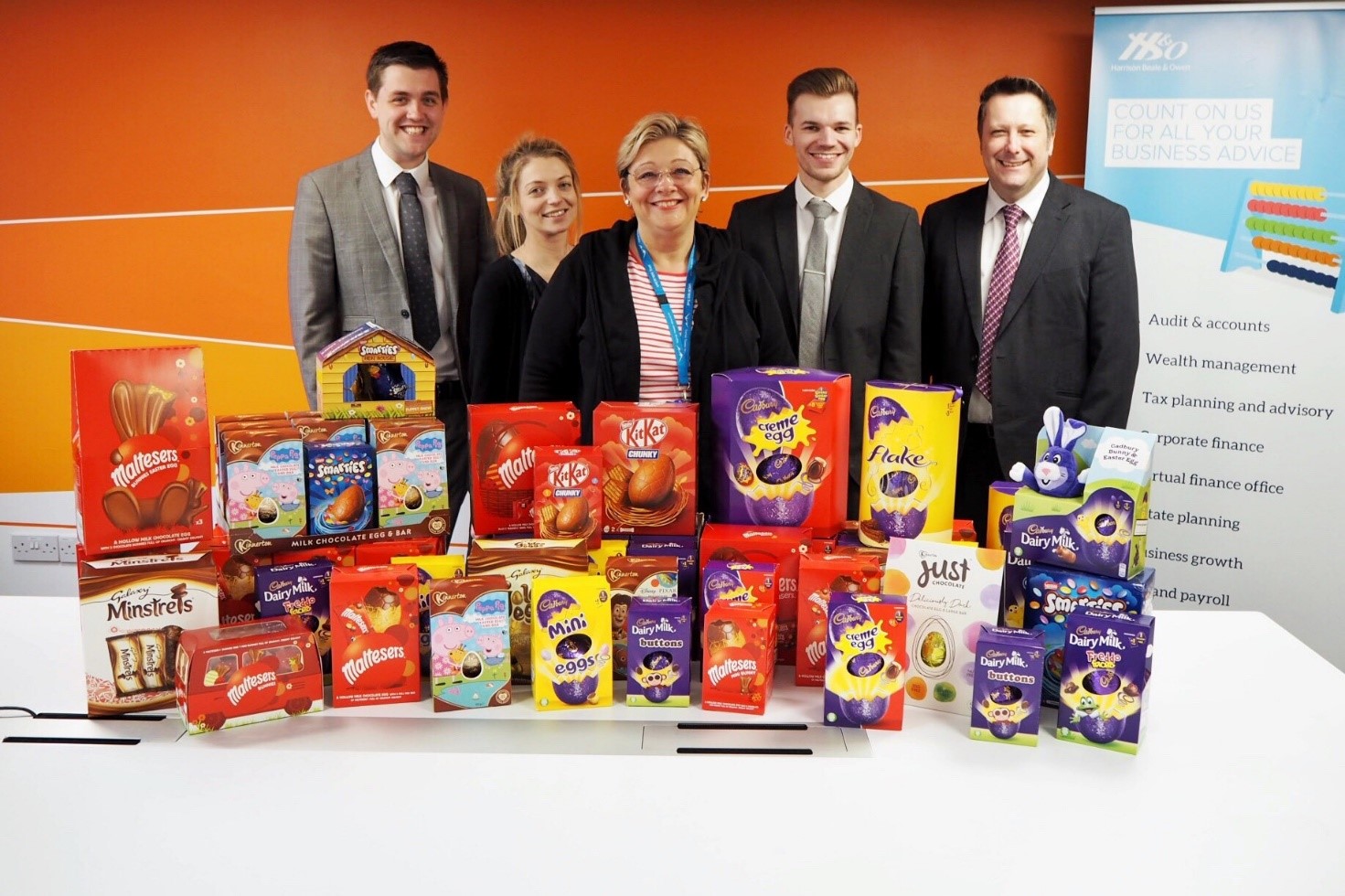 Harrison Beale & Owen donates over one hundred Easter Eggs to UHCW charity